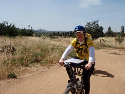 You can barely see the grass seeds weighing him down! A Happy Mr GPS enjoying the ride